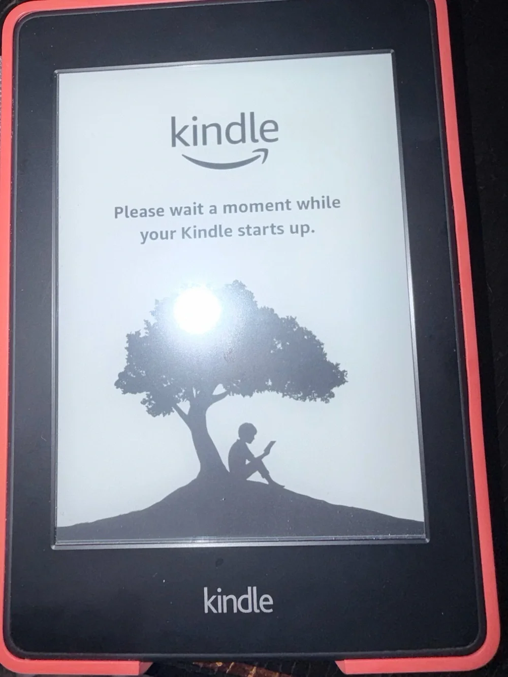 Amazon Kindle e-Reader with Coral Orange  Frame